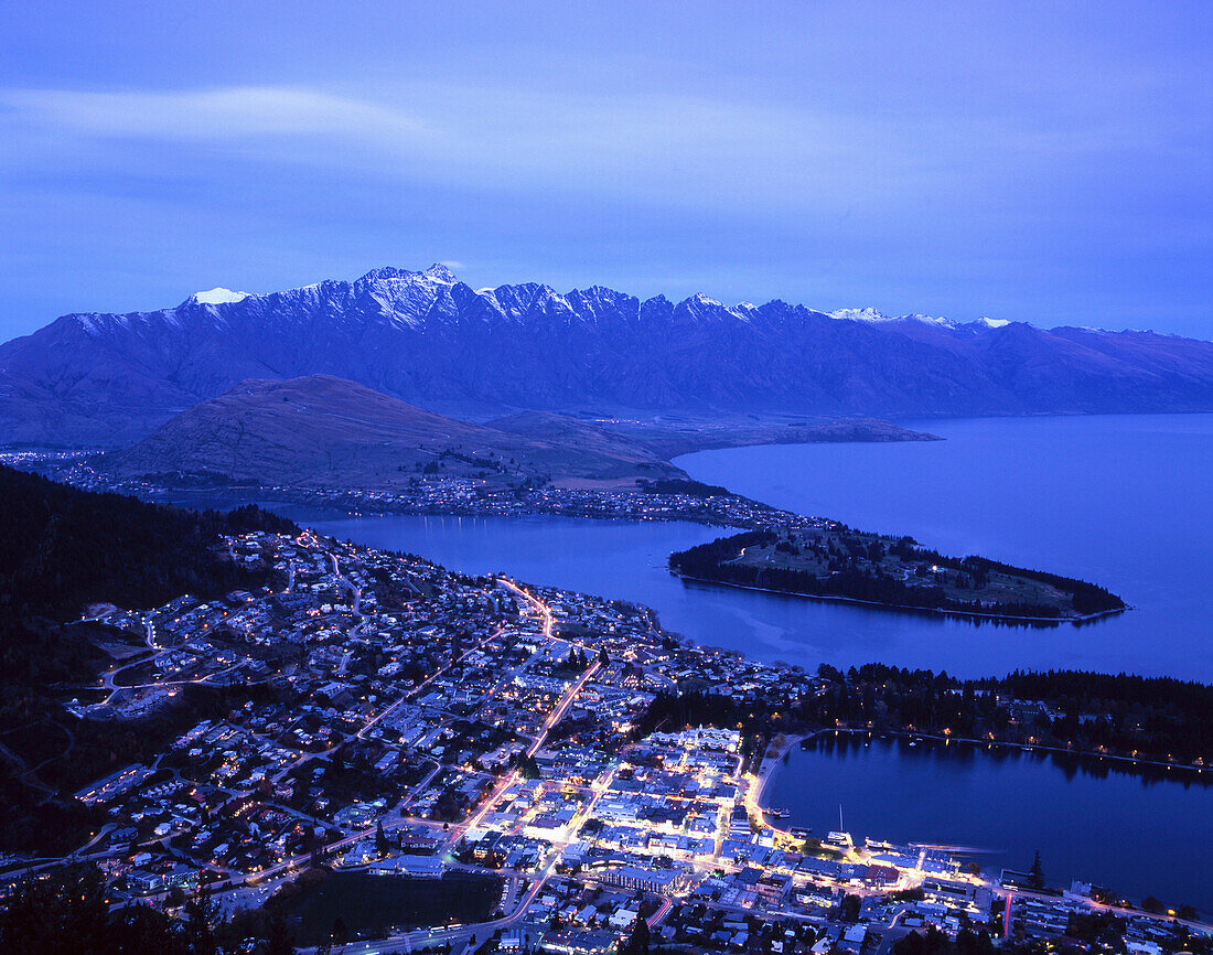 Town and Lake Wakatipu with The Remarkables at dusk, Queenstown, South Island, New Zealand