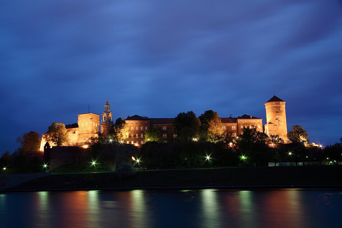 Reflexes of Wawel hill cathedral on the Vistula river, Krakow, Poland
