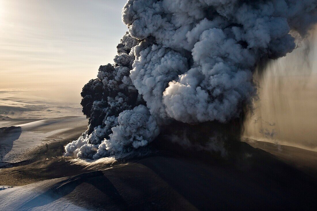 Image of the phreatic explosions at sunrise that produced substantial amounts of ash, steam and Ice