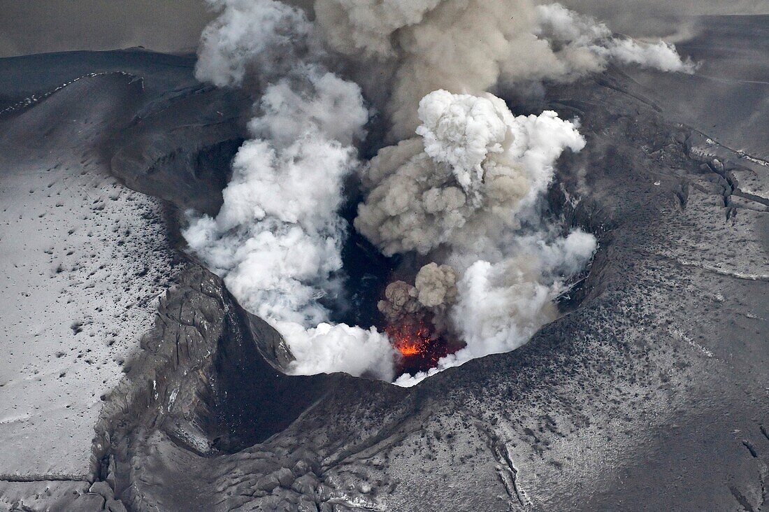 A close up view from the crater while lava explosions are taking place