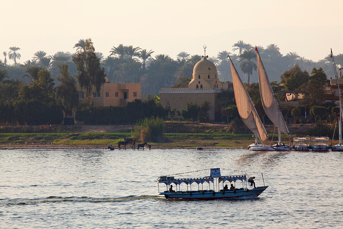 Feluccas and sunset over the river Nile, Luxor, formerly Thebes, Egypt, Africa