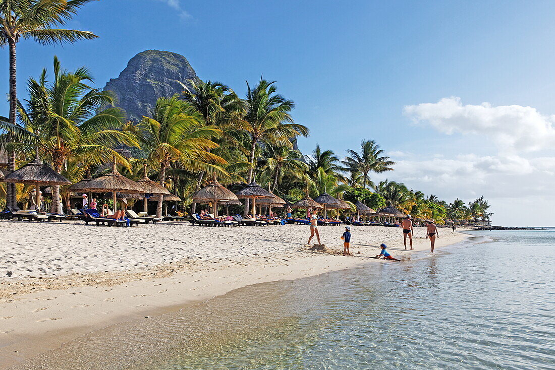 Beach and Le Morne Brabant mountain in the sunlight, Beachcomber Hotel Paradis &amp; Golf Club, Mauritius, Africa