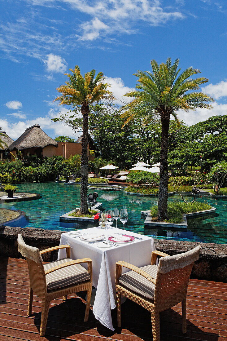 Pool and restaurant of the Shanti Maurice Resort in the sunlight, Souillac, Mauritius, Africa