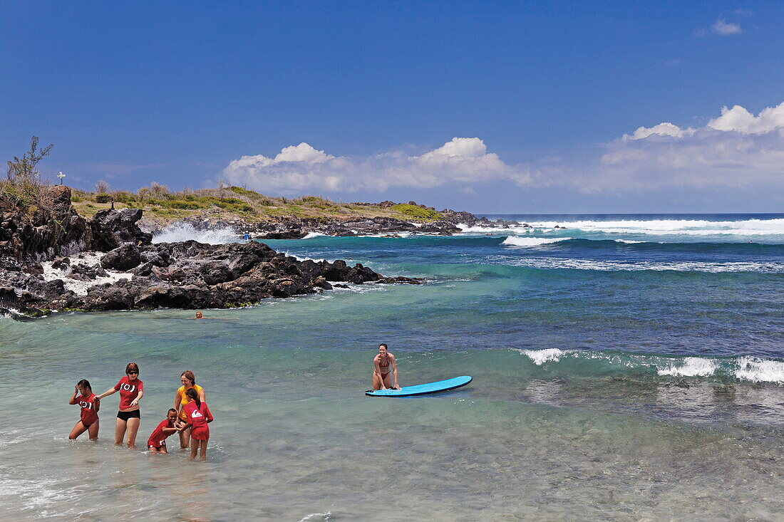 People bathing in the sea, Saint Gilles les Bains, La Reunion, Indian Ocean