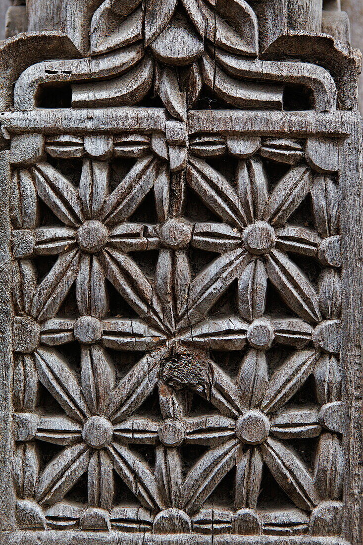 Detail in a carved wooden door, Stonetown, Zanzibar City, Zanzibar, Tanzania, Africa
