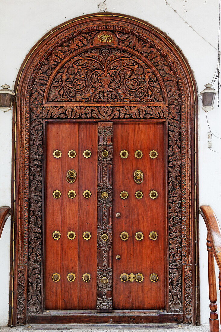 View of carved wooden door in the Stonetown, Zanzibar City, Zanzibar, Tanzania, Africa