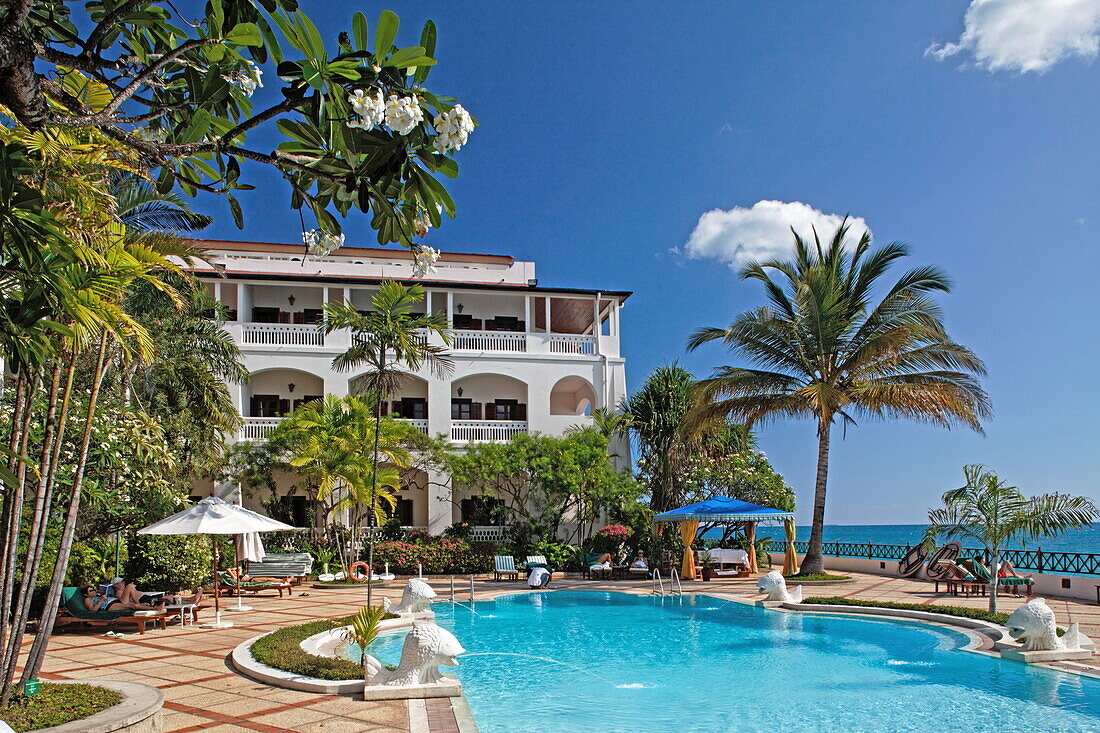 Pool in the sunlight in front of Serena Inn hotel, Stonetown, Zanzibar City, Zanzibar, Tanzania, Africa