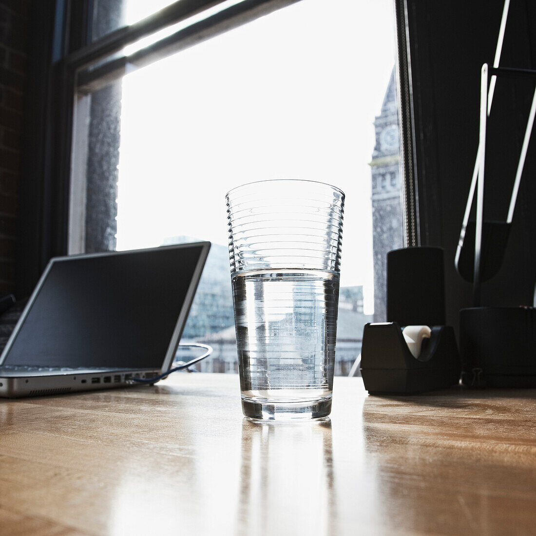 Glass of Water and Laptop on a Desk, Seattle, Washington, USA