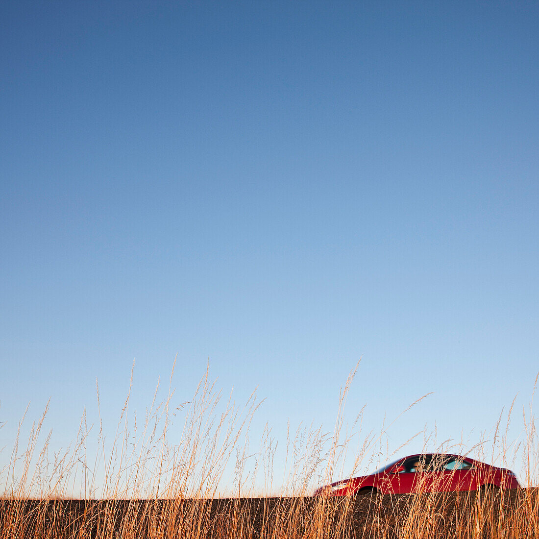 Red Car On the Road, Rural Eastern Washington, USA