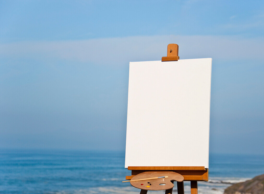 Artist's Easel and Supplies on Beach, CA, USA