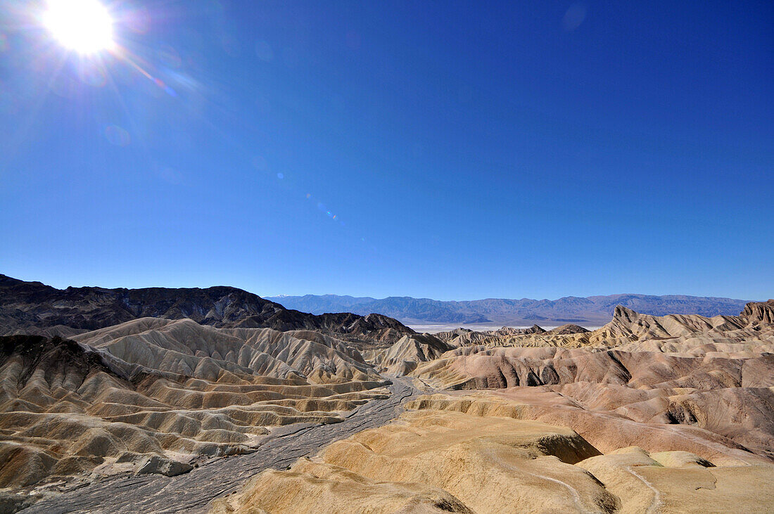Zabriskie Point under blue sky, Death Valley National Park, California, USA, America