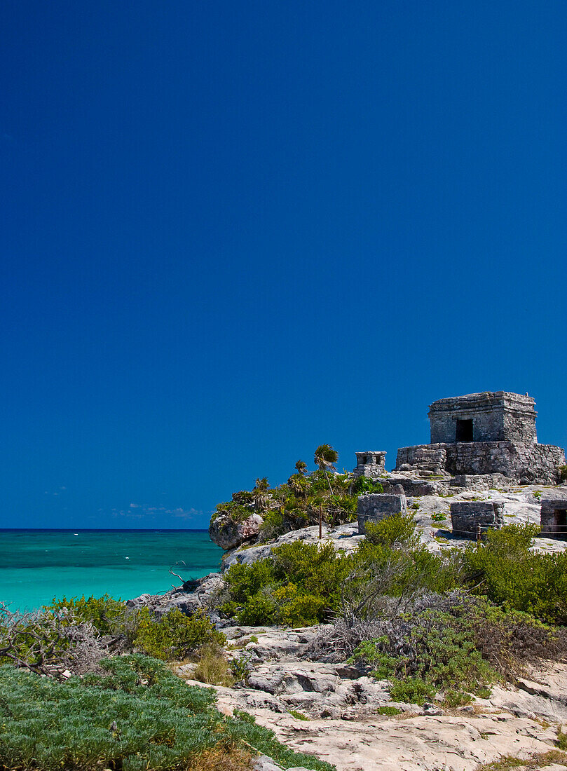 View to the Temple of the Wind and and the ocean, Tulum, Quintana Roo, Mexico