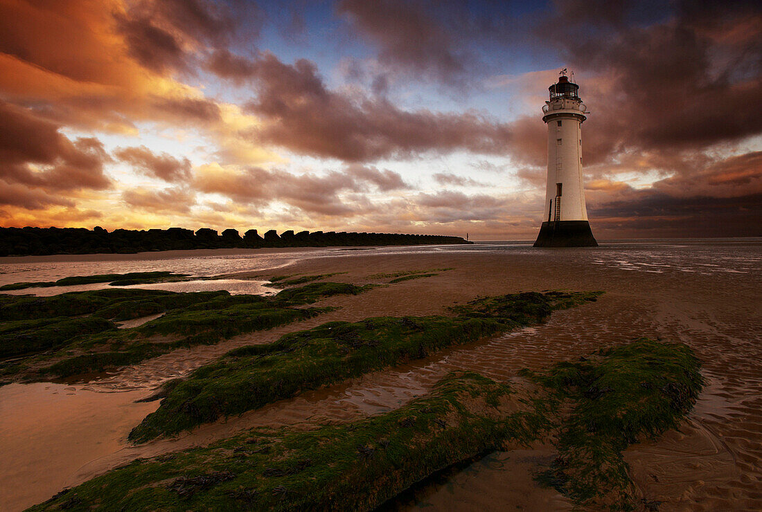 Perch Rock Lighthouse at sunset, New Brighton, Merseyside, UK - England