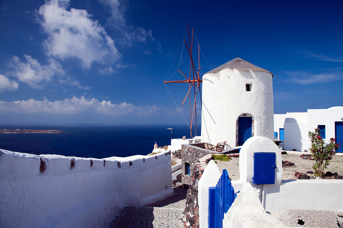 Windmill overlooking sea, Oia, Santorini Island, Greek Islands