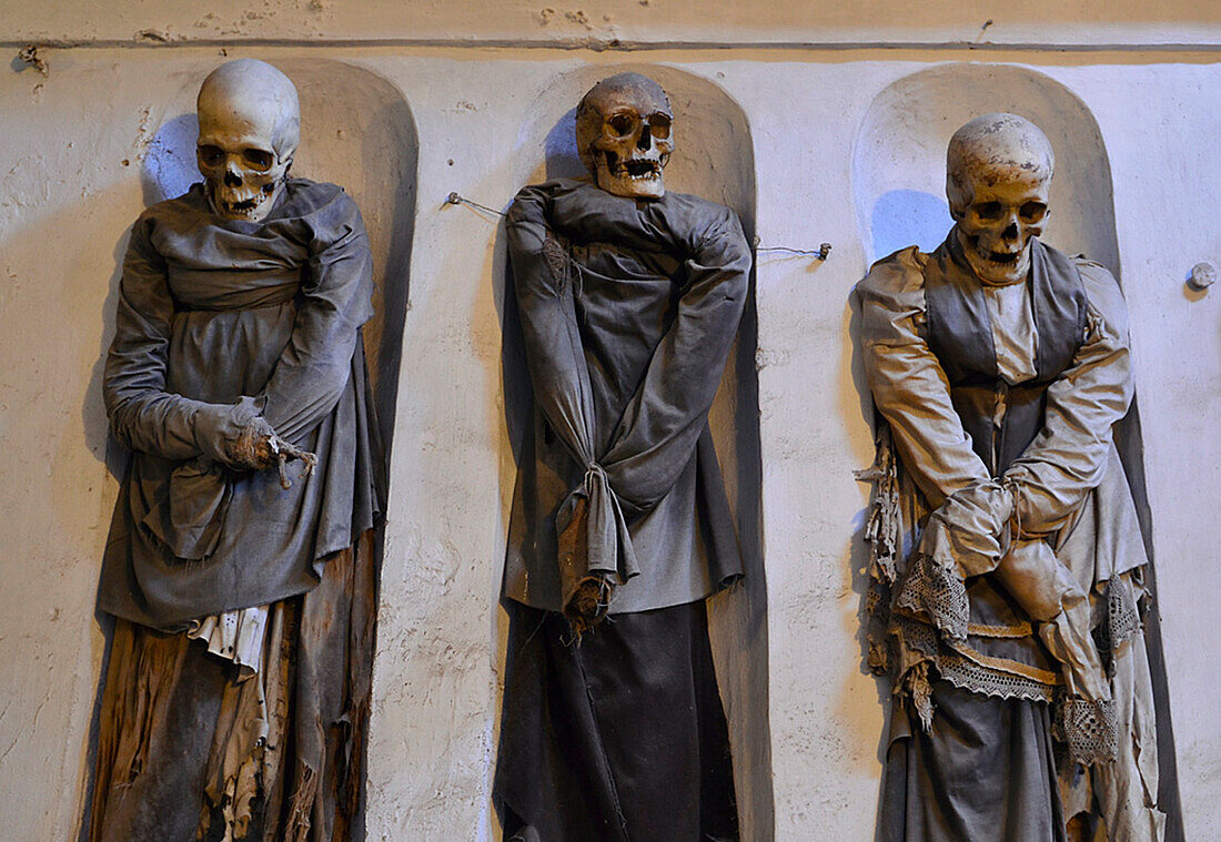 Three mummies, catacombs, Abbey dei Cappuccini, Palermo, Sicily, Italy