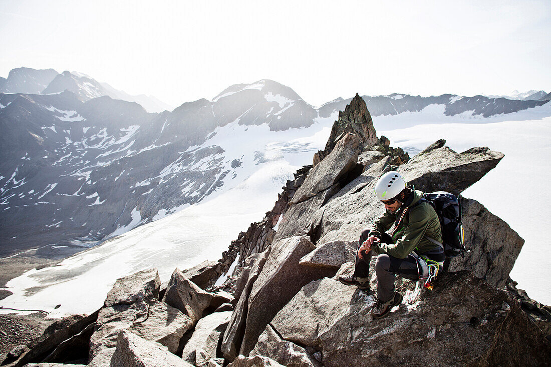 Mountaineer at Ostgrat, Wilde Leck, Stubai Alps, Tyrol, Austria