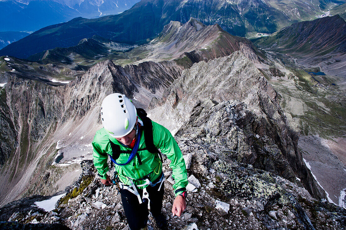 Mountaineer at north ridge, Acherkogel, Stubai Alps, Tyrol, Austria