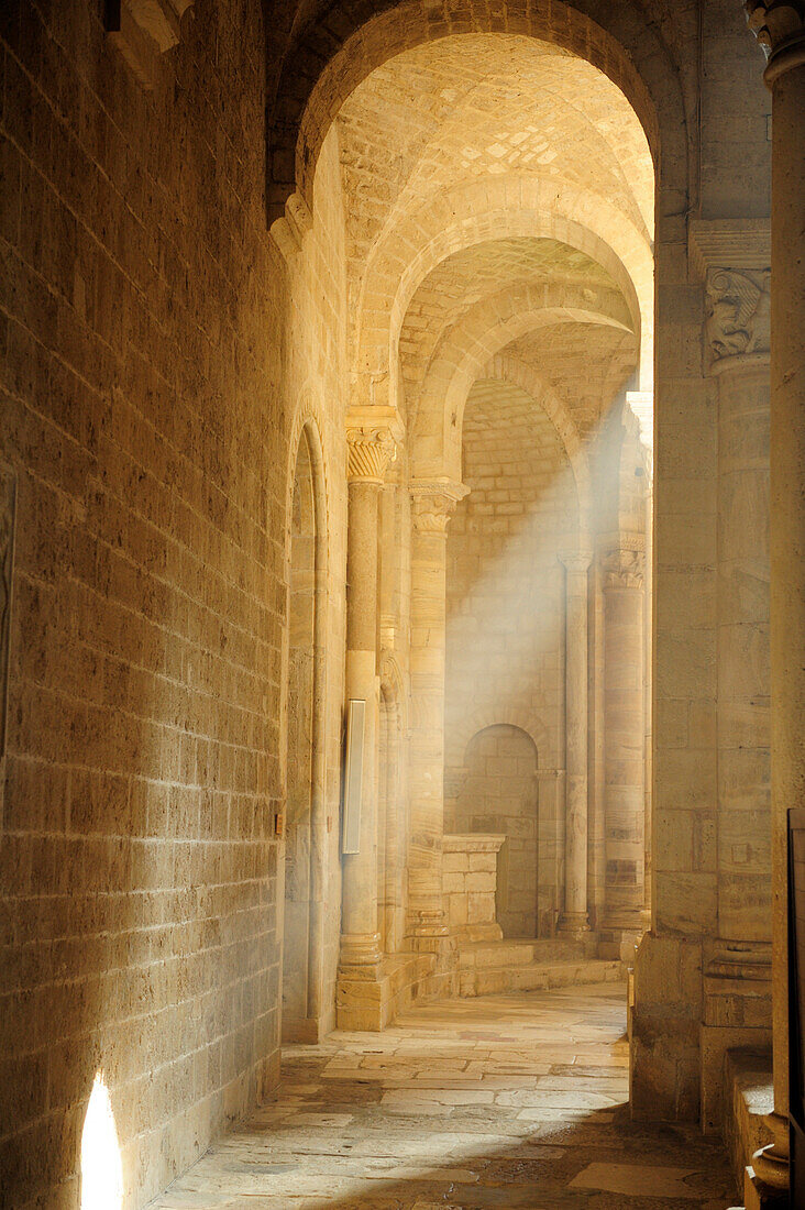 Light beam in romanesque church San Antimo, San Antimo, Tuscany, Italy