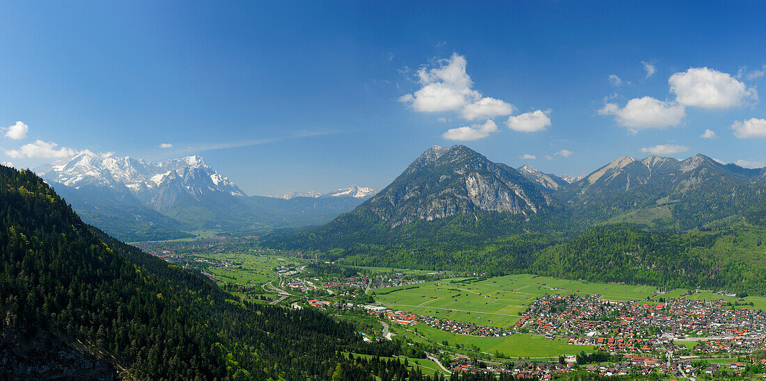 View of valley of Garmisch-Partenkirchen with Alpspitze, Zugspitze and Kramerspitze in the background, Farchant, Garmisch-Partenkirchen, Wetterstein range, Werdenfels, Upper Bavaria, Bavaria, Germany, Europe