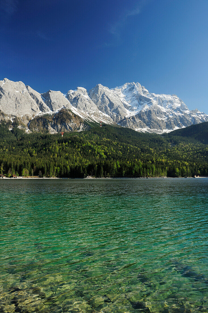 Zugspitze above lake Eibsee in the sunlight, lake Eibsee, Garmisch-Partenkirchen, Wetterstein range, Werdenfels, Upper Bavaria, Bavaria, Germany, Europe