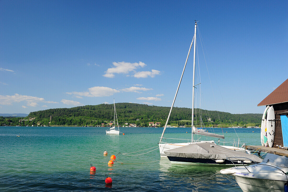Sailing boats at boathouse at lake Woerthersee, lake Woerthersee, Carinthia, Austria, Europe