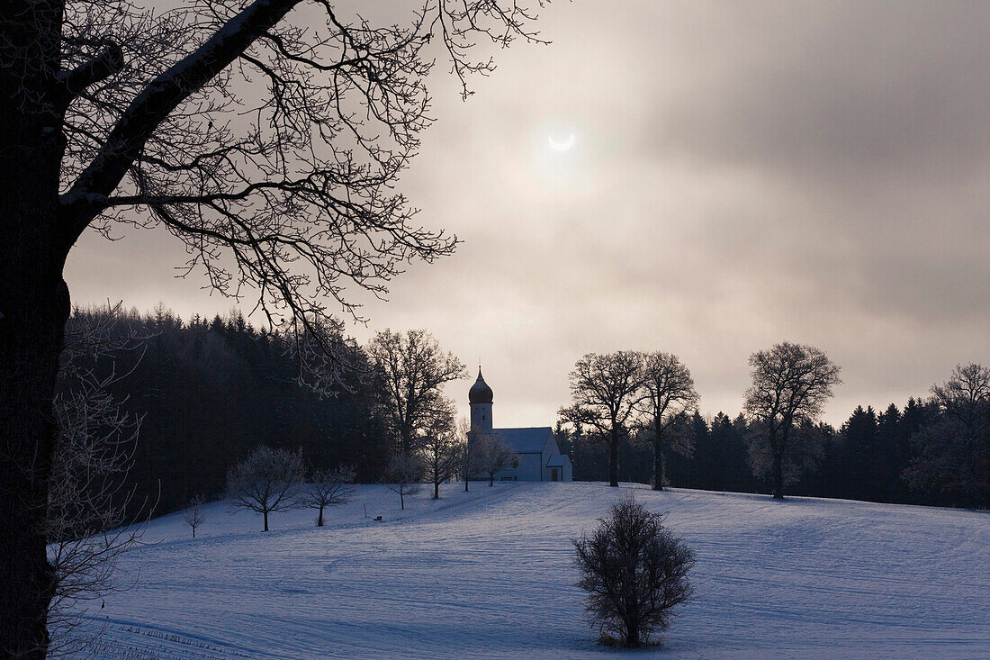 Partial solar eclipse , Hub chapel, Penzberg, Upper Bavaria, Germany