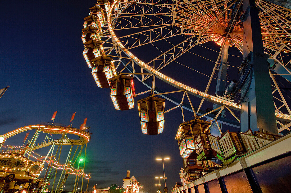 Illuminated ferris wheel at the Oktoberfest at night, Theresienwiese, Munich, Bavaria, Germany, Europe, Europe