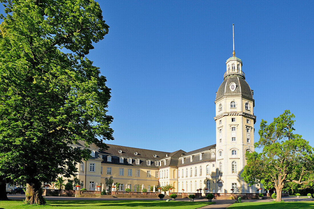 Castle Schloss Karlsruhe and gardens in the sunlight, Karlsruhe, Baden-Wuerttemberg, Germany, Europe