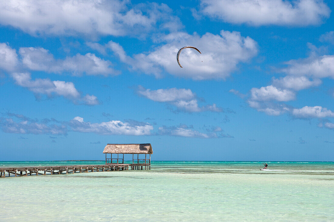 Pier and kitesurfer in lagoon, Cayo Guillermo (Jardines del Rey), Ciego de Avila, Cuba