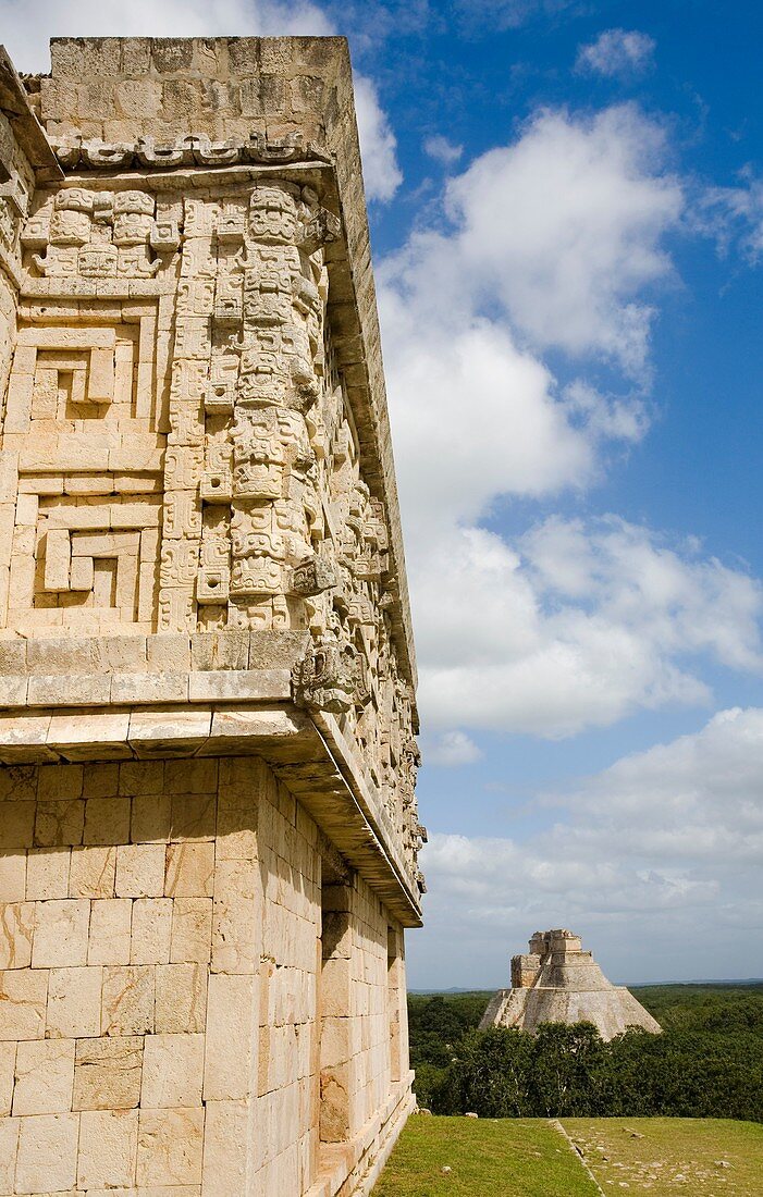 The GovernorÂ's Palace. Pyramid of the Magician on background in Pre-Columbian mayan ruins of Uxmal. Yucatan. Mexico.