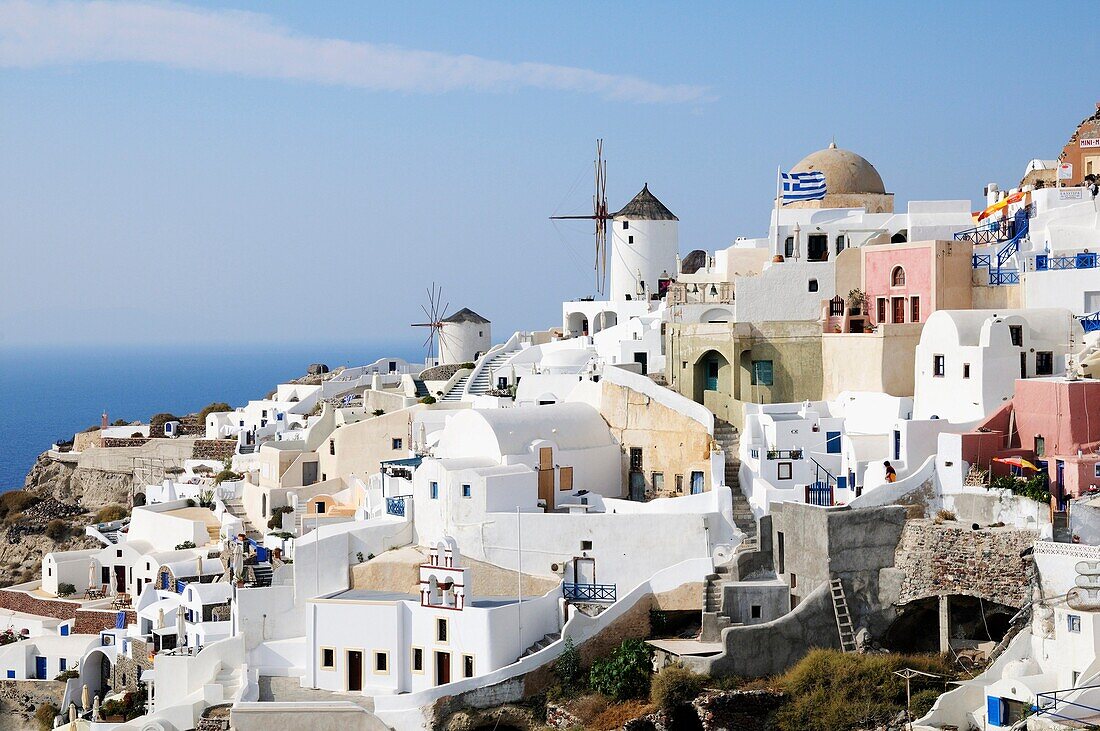 Greece, Cyclades, Santorini Village of Oia with its white houses and windmills