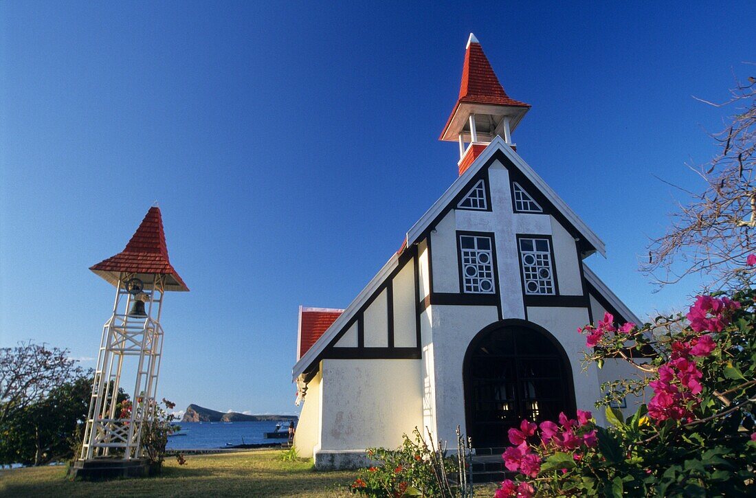 Famous red-roofed chapel/church of Notre Dame de l'Auxiliatrice Cape Malheureux, Mauritius Island, Indian Ocean