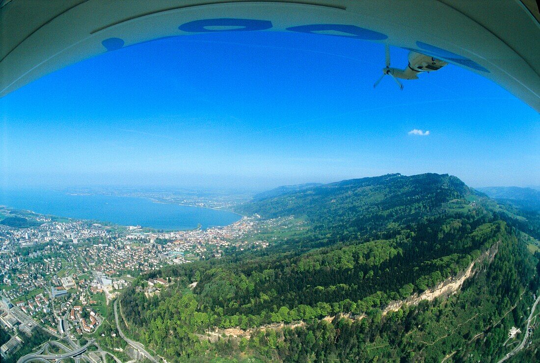 Aerial view from an airship dirigible Zeppelin NT of Bregenz town, Constance lake Bodensee and Pfänder summit, Austria
