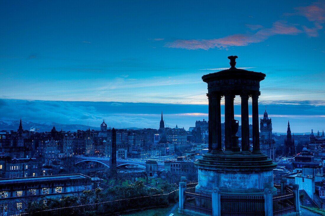 Scotland, Edinburgh, Calton Hill The Dugald Stewart Monument on Calton Hill, looking towards the Castle and Old Town of Edinburgh