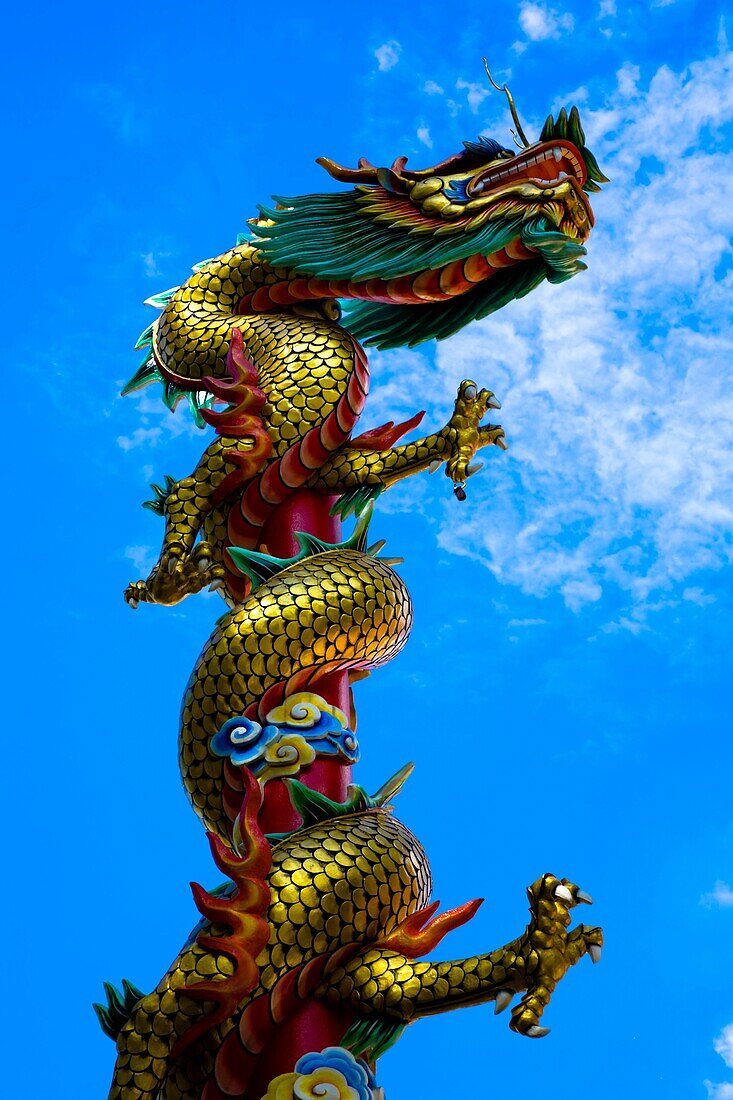 Thailand, Bangkok, Wat Chana Songkram A statue of a Dragon reaches upwards from a building forming part of the Wat Chana Songkram complex