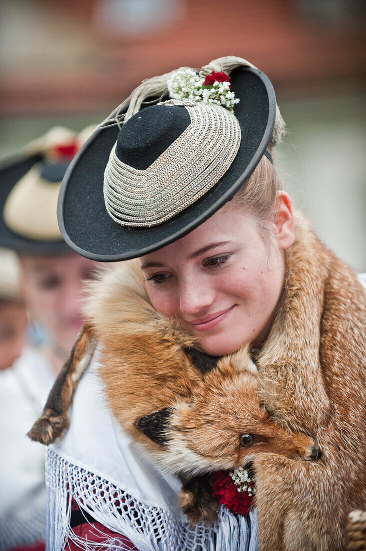 Woman wearing traditional costumes, festival of Leonhardiritt, Benediktbeuren, Bavaria, Germany