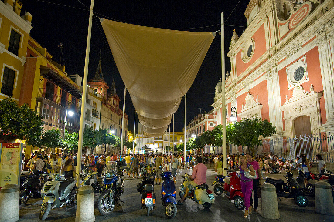 People at Plaza de Salvador at night, Sevilla, Andalusia, Spain, Europe