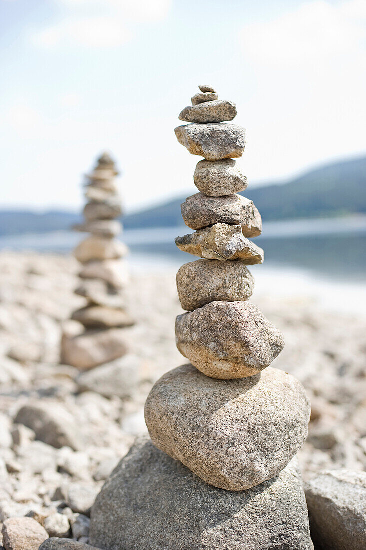 Cairns at lake Schluchsee, Black Forest, Baden-Wuerttemberg, Germany, Europe