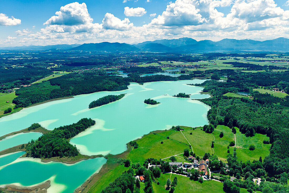 Aerial view over lakes Osterseen with mountain ridge Benediktenwand, Upper Bavaria, Germany, Europe