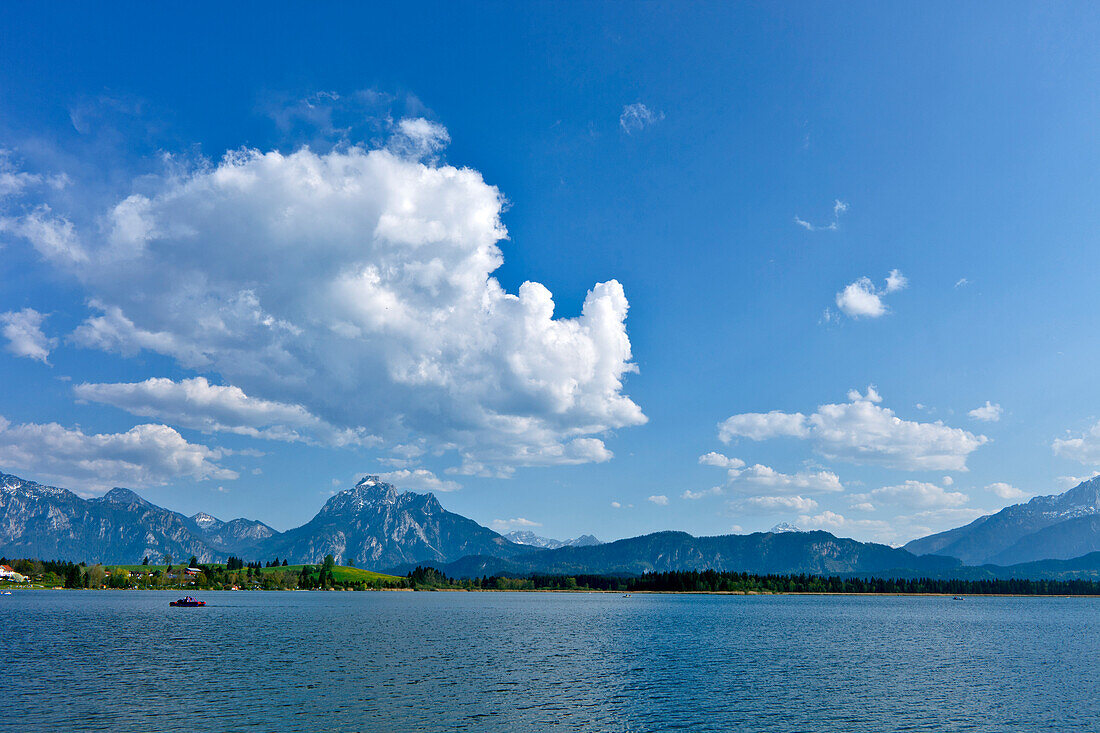 Lake Hopfensee under white clouds, East Allgaeu, Germany, Europe