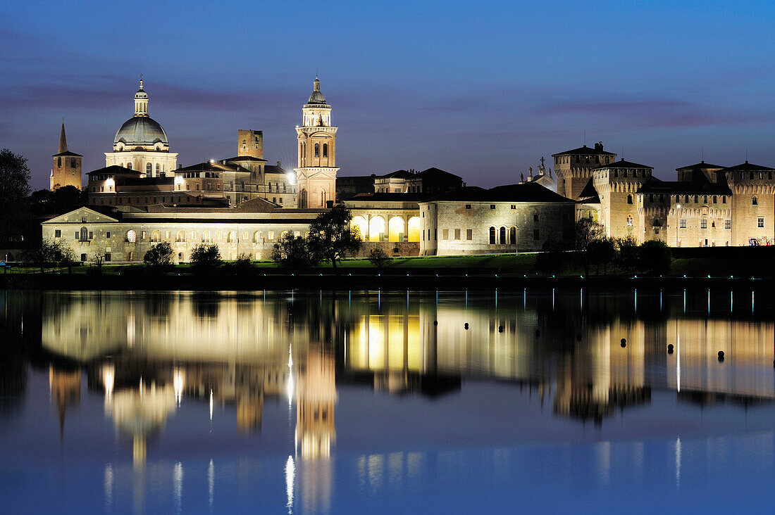 View over Mincio river to old town at night, Mantua, Lombardy, Italy