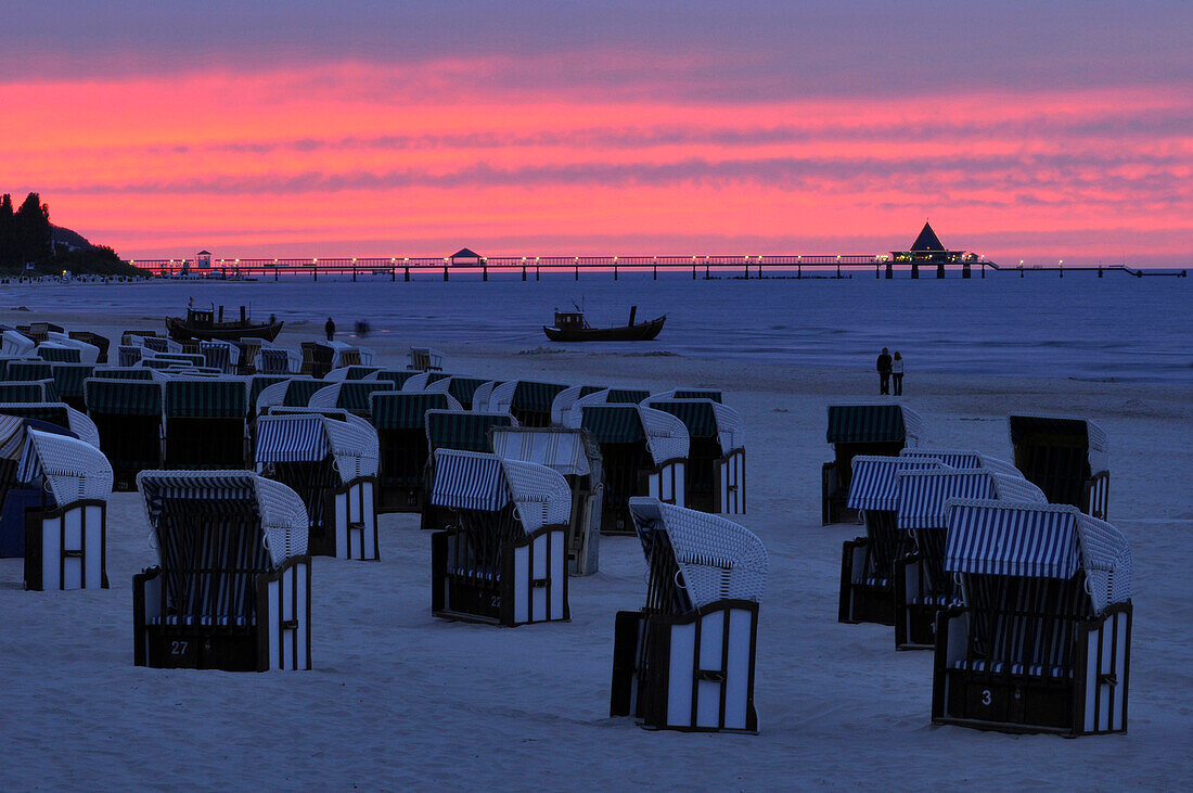Beach chairs in the afterglow, Heringsdorf pier, Usedom, Mecklenburg-Western Pomerania, Germany