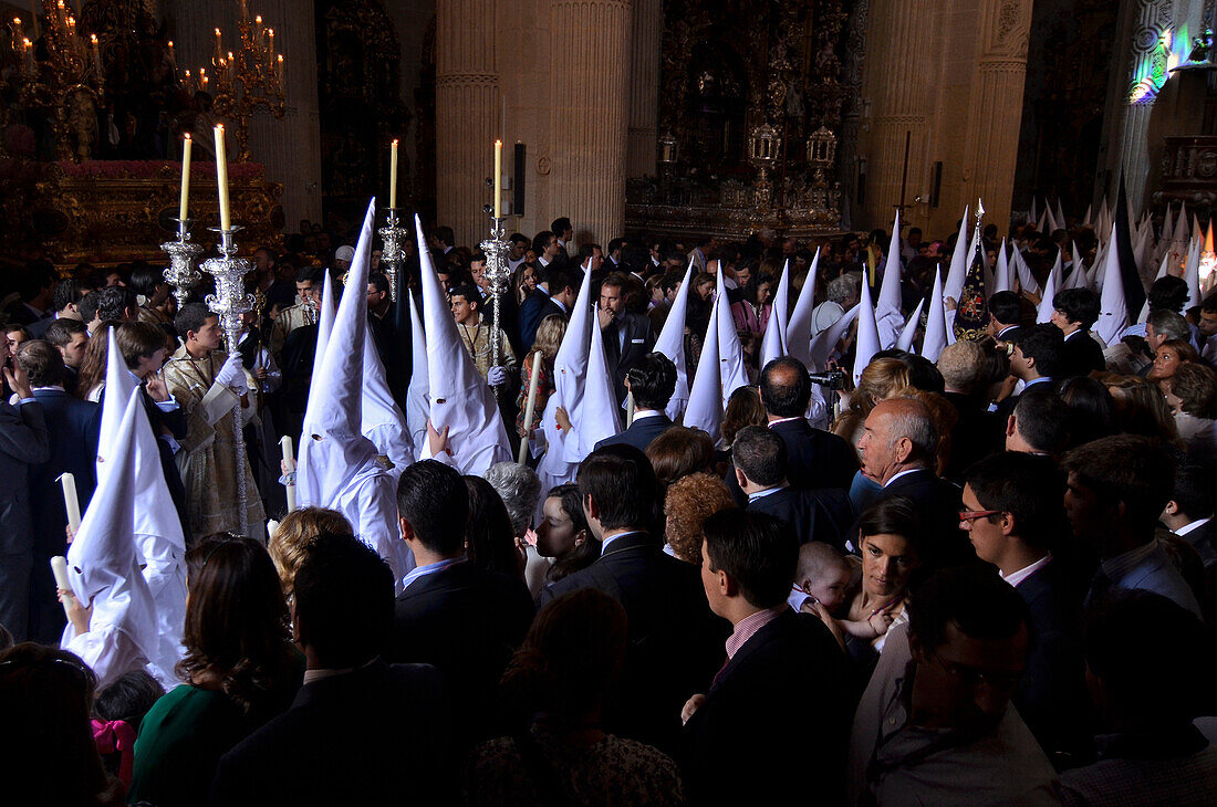 Nazarenos of the brotherhood La Borriquita at the church El Salvador on Palm Sunday, Semana Santa, Sevilla, Andalusia, Spain, Europe