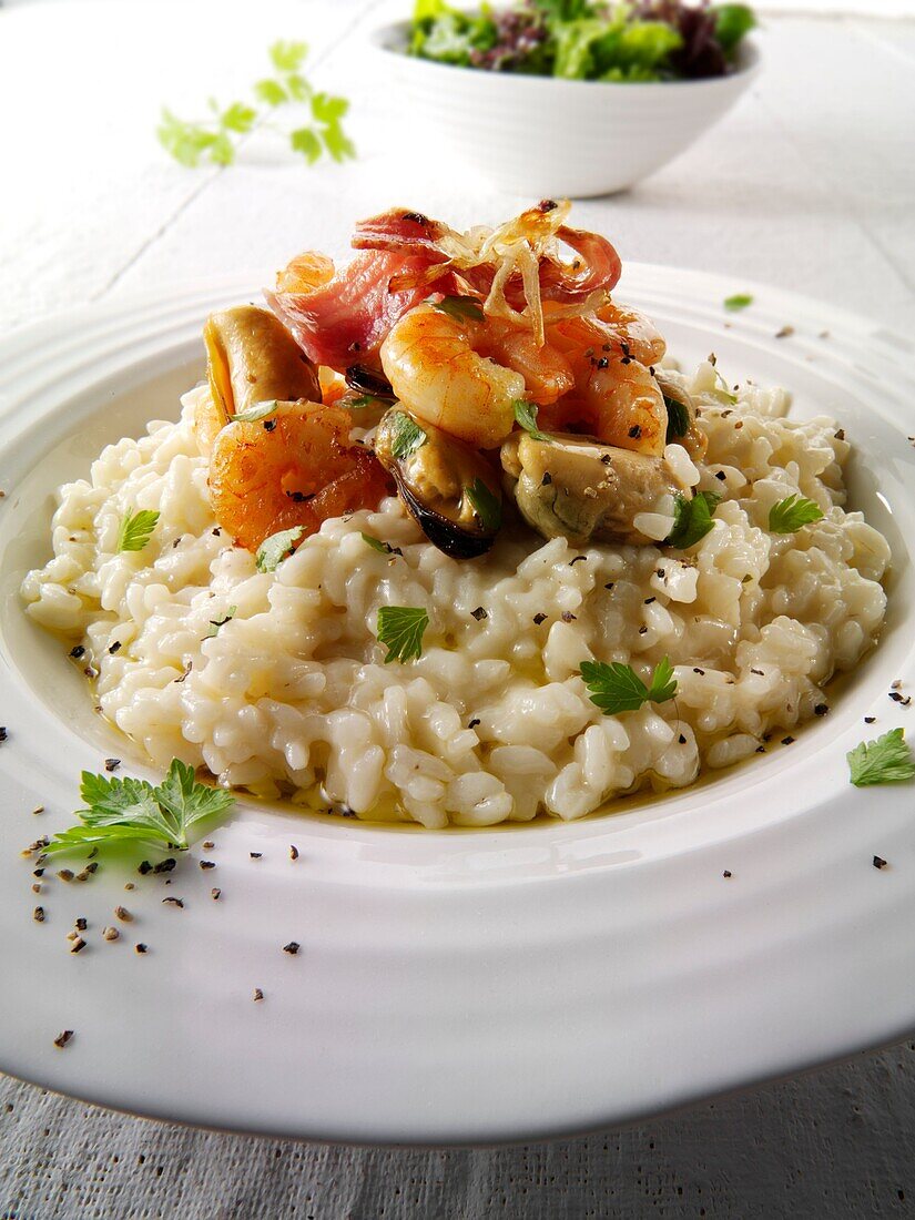 Classic risotto with prawns, mussels and bacon