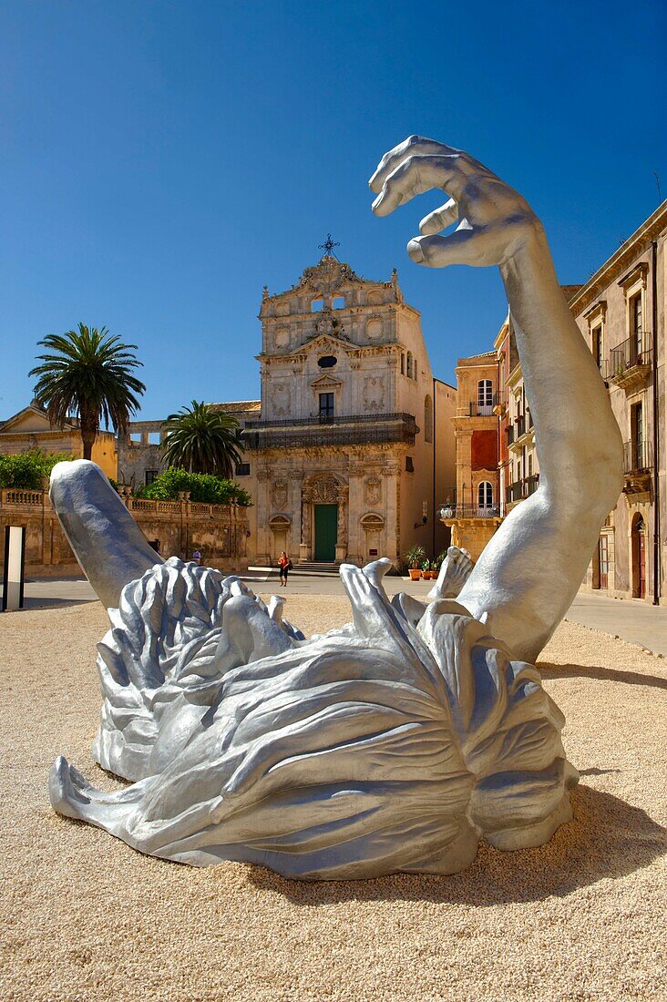 The Awakening a 70 ft sculpture aluminuim sculpture by Seward Johnson - Duomo square, Syracuse Siracusa, Sicily