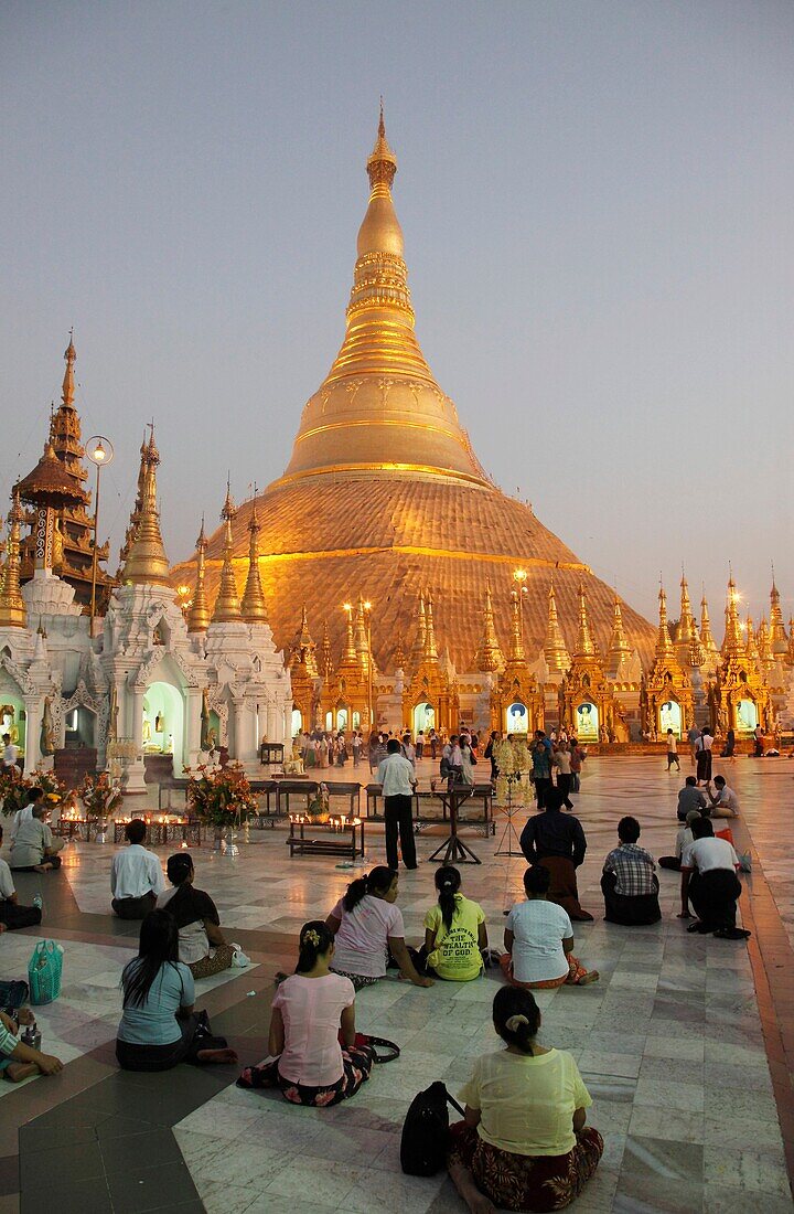 Myanmar, Burma, Yangon, Rangoon, Shwedagon Pagoda at night, people