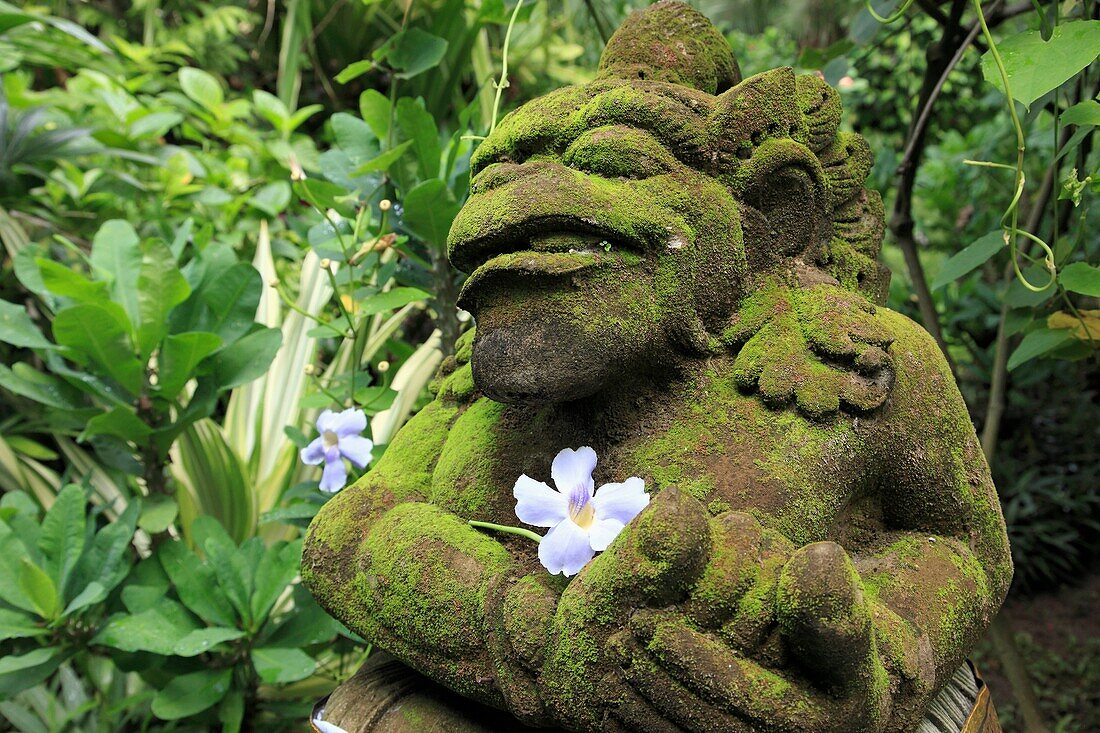 Indonesia, Bali, Sanur, moss covered garden statue, decoration
