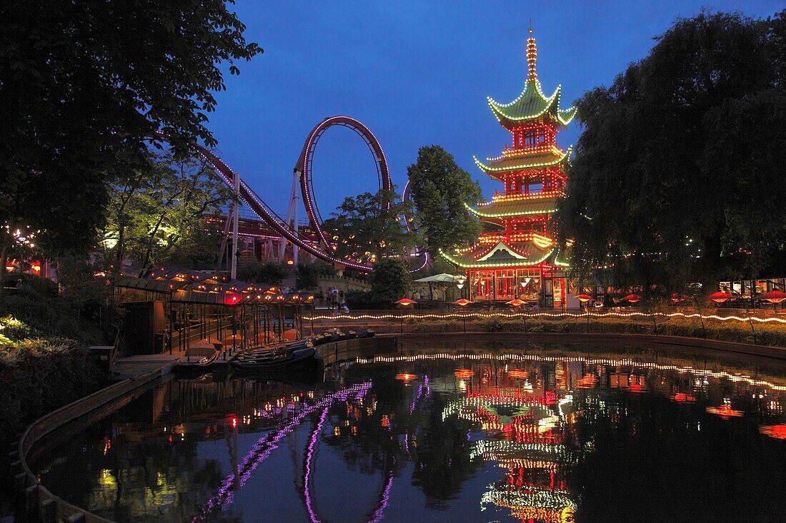 Denmark, Copenhagen, Tivoli amusement park at night