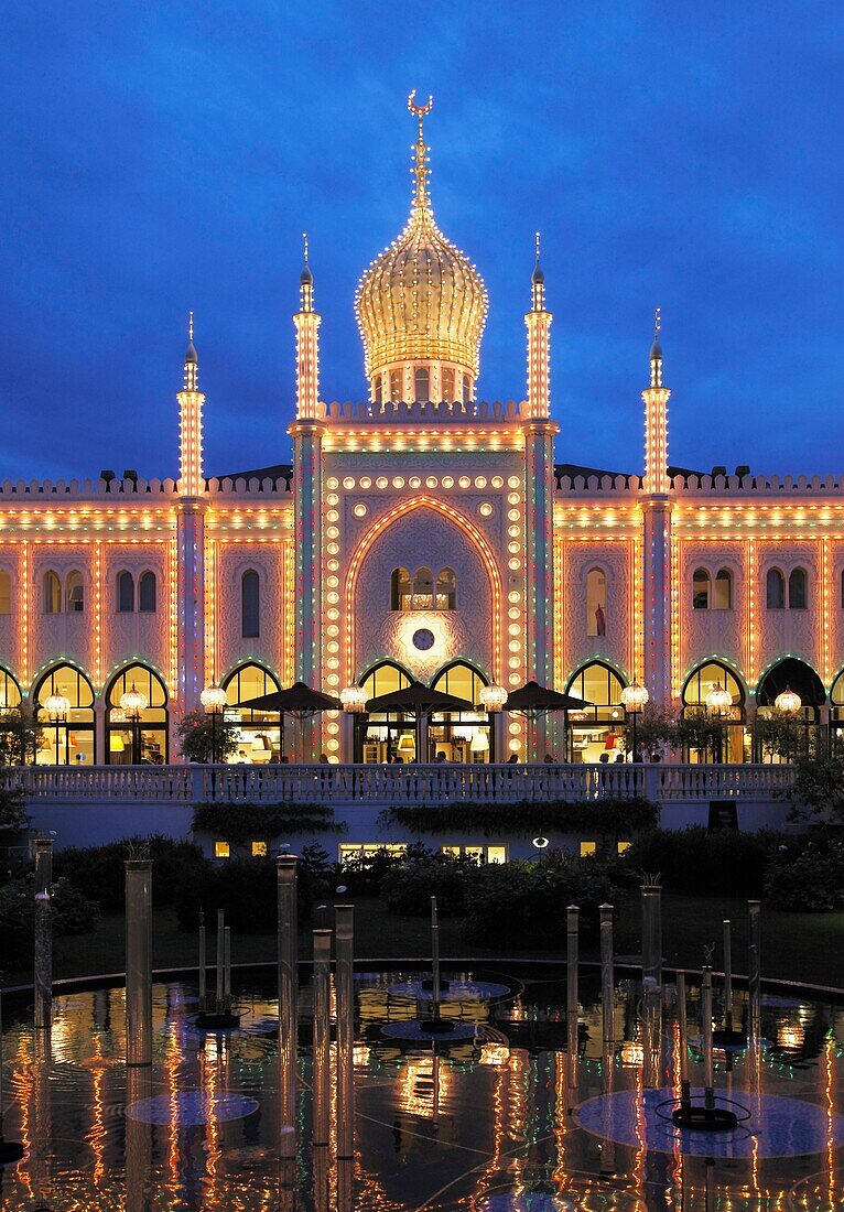 Denmark, Copenhagen, Tivoli amusement park at night