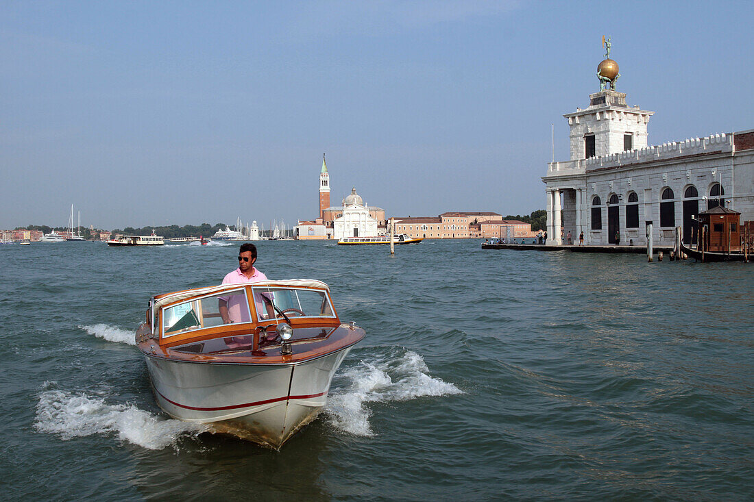 Motorboat at the Mouth of the Grand Canal with the San Giorgio Maggiore Church in the Background And, to the Right, the Punta Della Dogana (Customs’ Point), the Property of Francois Pinault, Today a Museum of Contemporary Art, Venice, Venetia, Italy
